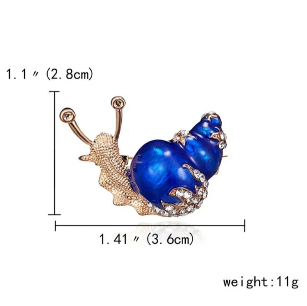 bijoux fantaisie, broches. divers coloris.